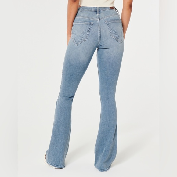 Top rated HIGH RISE MEDIUM WASH FLARE JEANS - Picture 2 of 2